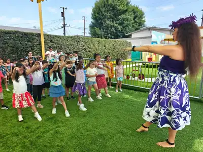Children participating in dance and fitness enrichment at Kids Adventure Learning Center expressing themselves through movement and creative play
