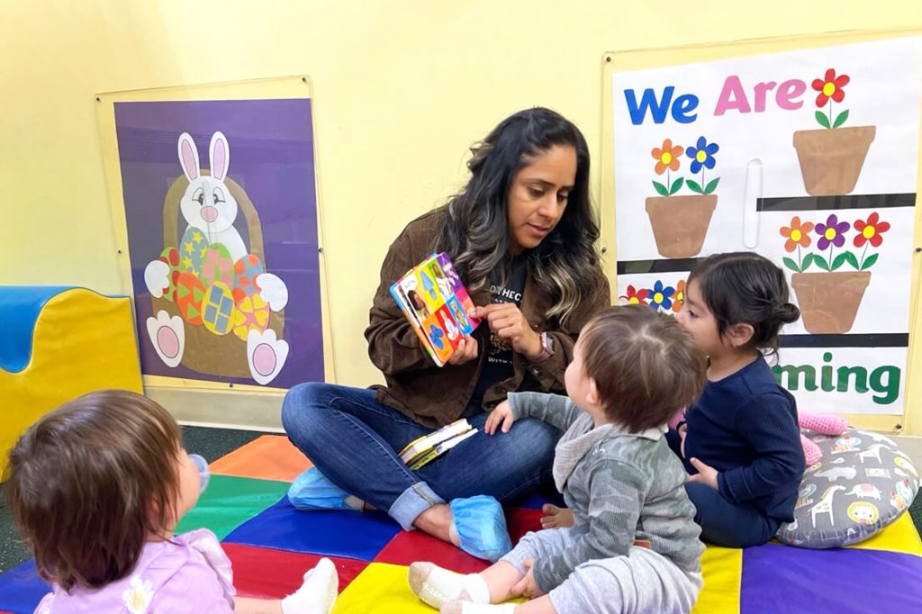 Staff in Kids Adventure Learning Center guiding children during a group activity