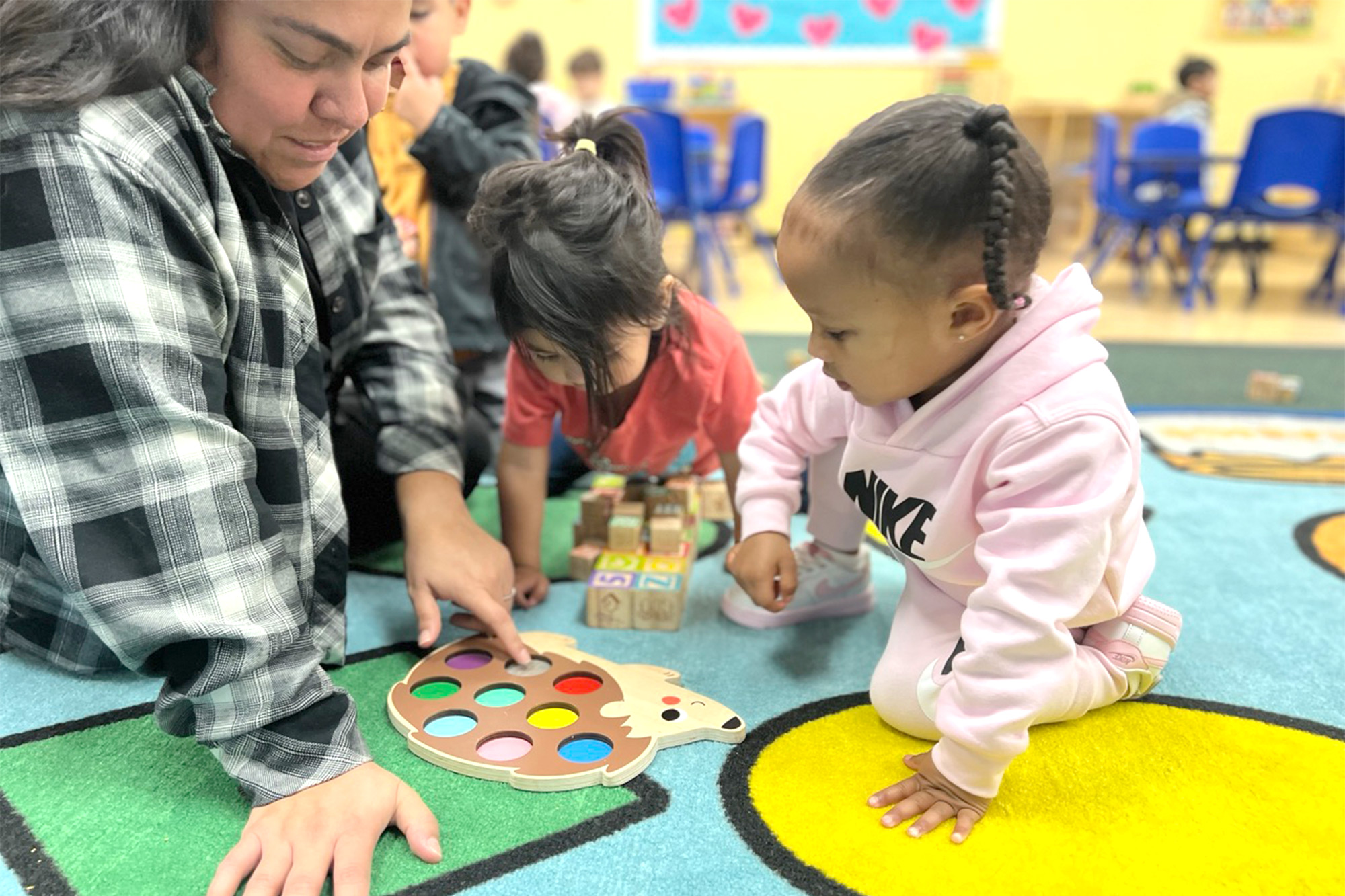The toddler will have access to age appropriate toys,