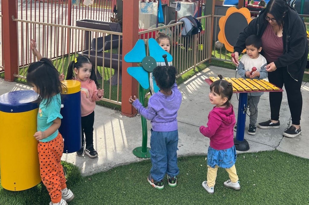 Children playing outdoors at Junior Preschool in Buena Park